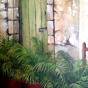a painting of an old green garden door
